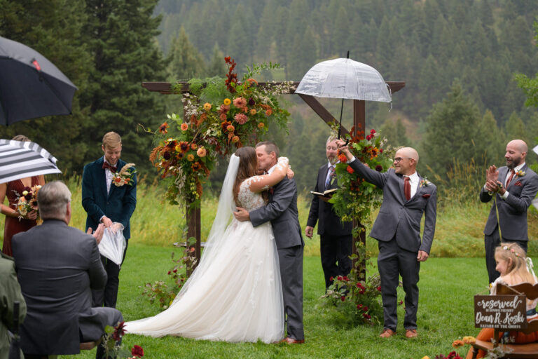 Wedding photos with green grass and rain